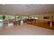 Clubhouse with tables, chairs, and dance floor at 2323 Feather Sound Dr # 202, Clearwater, FL 33762