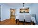 Dining area with kitchen view and hardwood floor at 2323 Feather Sound Dr # 202, Clearwater, FL 33762