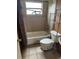 Bathroom with shower/tub combo and a toilet at 2317 8Th E Ave, Bradenton, FL 34208