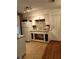 Functional kitchen with white appliances and tile flooring at 824 62Nd Ne Ave, St Petersburg, FL 33702