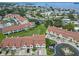 Aerial view of townhome community near the water at 2376 Hanover Dr, Dunedin, FL 34698