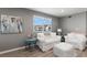 Relaxing living room with comfy white sofas and an ottoman at 2376 Hanover Dr, Dunedin, FL 34698