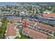 Aerial view of condo community near waterfront; unit is easily identified at 2376 Hanover Dr, Dunedin, FL 34698