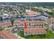 Aerial view of condo community; subject property is clearly marked at 2376 Hanover Dr, Dunedin, FL 34698