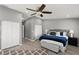 Spacious main bedroom with a king-size bed and ample closet space at 2376 Hanover Dr, Dunedin, FL 34698