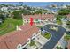 Aerial view of the property and surrounding waterfront at 2376 Hanover Dr, Dunedin, FL 34698