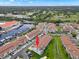 Aerial view showing condo unit and surrounding neighborhood at 2376 Hanover Dr, Dunedin, FL 34698