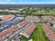 Aerial view of a condo community near the water at 2376 Hanover Dr, Dunedin, FL 34698