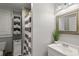 Simple bathroom with shower, toilet and white vanity at 2376 Hanover Dr, Dunedin, FL 34698