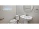 Convenient powder room with pedestal sink and toilet at 2503 Arch Ave # 139W, Oldsmar, FL 34677