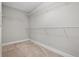 Large walk-in closet with wire shelving at 2503 Arch Ave # 139W, Oldsmar, FL 34677