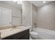 Clean bathroom with granite vanity, tub shower combo, and updated fixtures at 2503 Arch Ave # 139W, Oldsmar, FL 34677