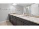 Double vanity bathroom with granite countertop at 2503 Arch Ave # 139W, Oldsmar, FL 34677