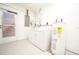 Convenient laundry room with washer, dryer and water heater at 824 62Nd Ne Ave, St Petersburg, FL 33702