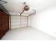 Attached garage with automatic opener and storage cabinets at 824 62Nd Ne Ave, St Petersburg, FL 33702