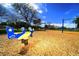 Playground with a blue airplane spring rider at 824 62Nd Ne Ave, St Petersburg, FL 33702