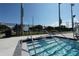 Steps leading into a refreshing community pool at 824 62Nd Ne Ave, St Petersburg, FL 33702