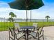 Outdoor patio featuring comfortable seating with views of the Intracoastal Waterway at 100 Oakmont Ln # 301, Belleair, FL 33756