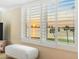 A close up of the water views with shutters at 100 Oakmont Ln # 301, Belleair, FL 33756