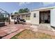 Open patio space with a brick design, BBQ, and storage shed perfect for outdoor living at 1172 Chelsea Ln, Holiday, FL 34691