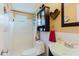 Bathroom featuring a shower, toilet, and sink with a medicine cabinet at 1172 Chelsea Ln, Holiday, FL 34691