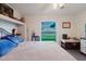 Bright bedroom with a view, featuring a comfortable bed and a calming atmosphere at 1172 Chelsea Ln, Holiday, FL 34691
