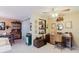 Bright interior view of a home office area and kitchen and dining areas at 1172 Chelsea Ln, Holiday, FL 34691