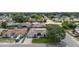 Street view of home with well-manicured front lawn and mature tree at 1172 Chelsea Ln, Holiday, FL 34691