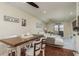 Open concept dining area with a view of the living room and kitchen at 5245 Amulet Dr # 306, New Port Richey, FL 34652