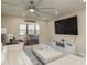Living room with sectional sofa, large TV, and electric fireplace at 5245 Amulet Dr # 306, New Port Richey, FL 34652