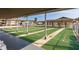 Community shuffleboard courts with covered seating at 5245 Amulet Dr # 306, New Port Richey, FL 34652