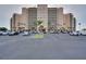 Large building with parking lot at 880 Mandalay Ave # C713, Clearwater Beach, FL 33767