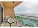 Balcony with stunning ocean and pool views at 880 Mandalay Ave # C713, Clearwater Beach, FL 33767