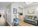 Living room with gray couch and blue side table at 5701 Bahia Del Mar Cir # 507, St Petersburg, FL 33715
