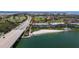 Aerial view highlighting building location near beach and bridge at 5701 Bahia Del Mar Cir # 507, St Petersburg, FL 33715