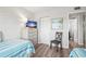 Bedroom with twin beds, dresser, and closet at 5701 Bahia Del Mar Cir # 507, St Petersburg, FL 33715