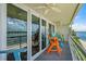 Bright balcony with patio furniture and water views at 5701 Bahia Del Mar Cir # 507, St Petersburg, FL 33715