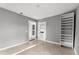 Spacious spare room with tile floors and access to another room at 55 W Lemon St, Tarpon Springs, FL 34689