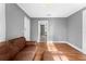 Living room with hardwood floors and a view to another room at 55 W Lemon St, Tarpon Springs, FL 34689