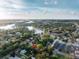 House nestled amongst lush vegetation near a waterway at 55 W Lemon St, Tarpon Springs, FL 34689
