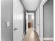 Bright hallway with neutral gray walls and tile flooring at 55 W Lemon St, Tarpon Springs, FL 34689