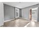 Simple spare room with tile floors and ceiling fan at 55 W Lemon St, Tarpon Springs, FL 34689