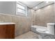 Clean bathroom with a bathtub, toilet, and tile at 55 W Lemon St, Tarpon Springs, FL 34689