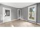 Bright spare room with tile floors and built-in shelving at 55 W Lemon St, Tarpon Springs, FL 34689