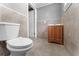 Bathroom with a toilet and wooden vanity at 55 W Lemon St, Tarpon Springs, FL 34689