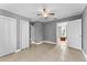 Spacious bedroom with tile floors and multiple entries at 55 W Lemon St, Tarpon Springs, FL 34689
