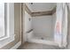 Updated shower with tile surround and built-in seat at 55 W Lemon St, Tarpon Springs, FL 34689