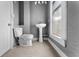 Clean bathroom with pedestal sink and toilet at 55 W Lemon St, Tarpon Springs, FL 34689