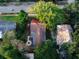 Aerial view showcasing the home's roofline and backyard at 55 W Lemon St, Tarpon Springs, FL 34689