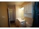 Bathroom with toilet, vanity, and linen closet at 1829 Bough Ave # 4, Clearwater, FL 33760